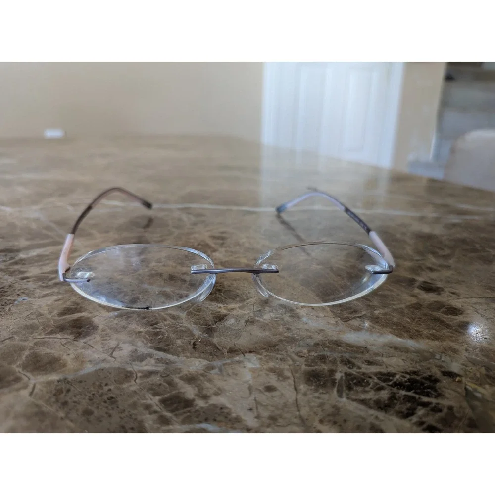 Silhouette Eyeglasses 4476 40 6053 52[]17 135 5416 Titan Creme Rimless Austria